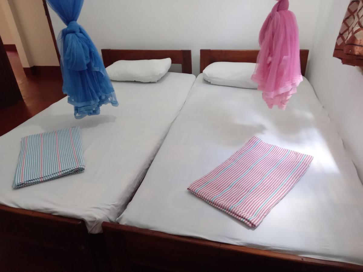 Vibushan Guest House Nilaveli Bagian luar foto
